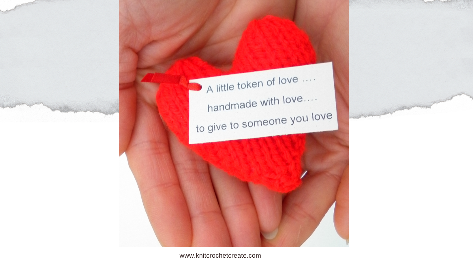 Two hands holding a knitted heart made from free knitted hearts pattern. A handmade tag is attached with a special message for a loved one