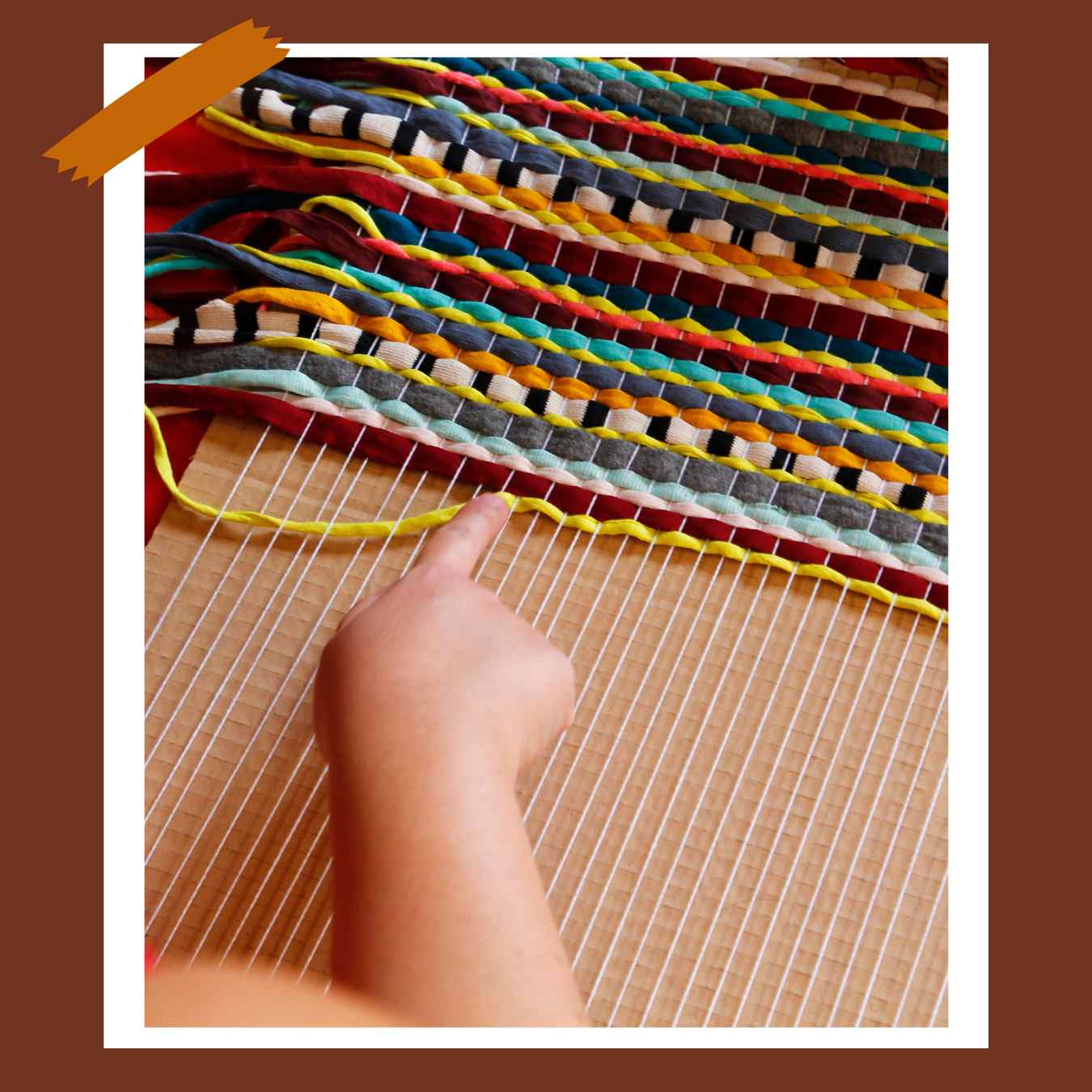 A handmade weaving loom from cardboard