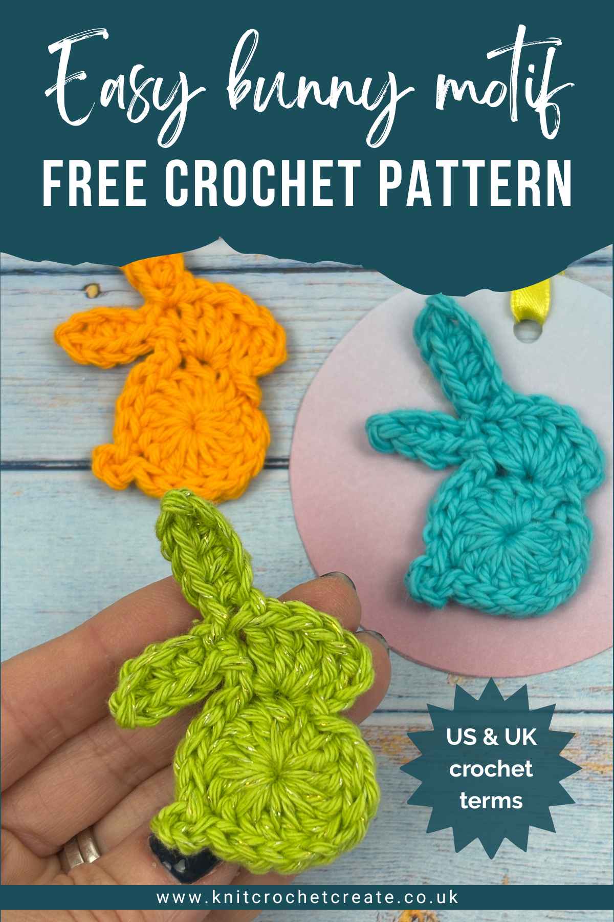 Hand holding a tiny bunny motif crocheted in green yarn.