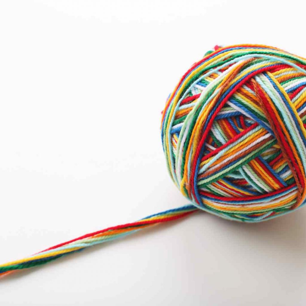 Ball of yarn made from lots of strands for a stash-busting project