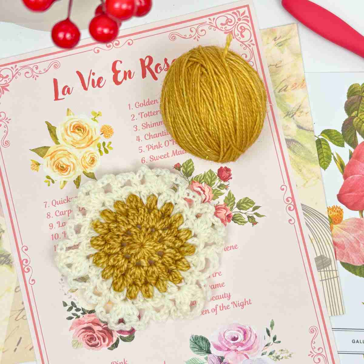 A single Crochet Granny Hexagon Motif made from free pattern, using mustard yarn for the centre rounds and cream for the outside edge.