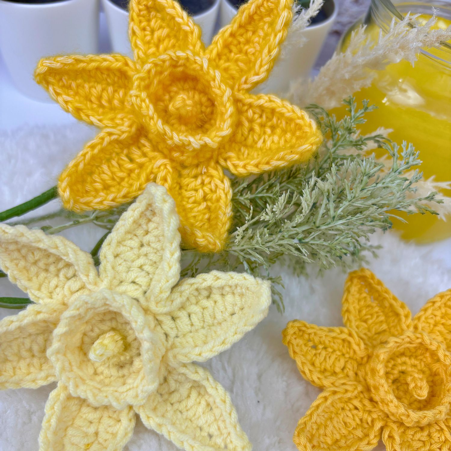3 crochet daffodil flowers made from free pattern