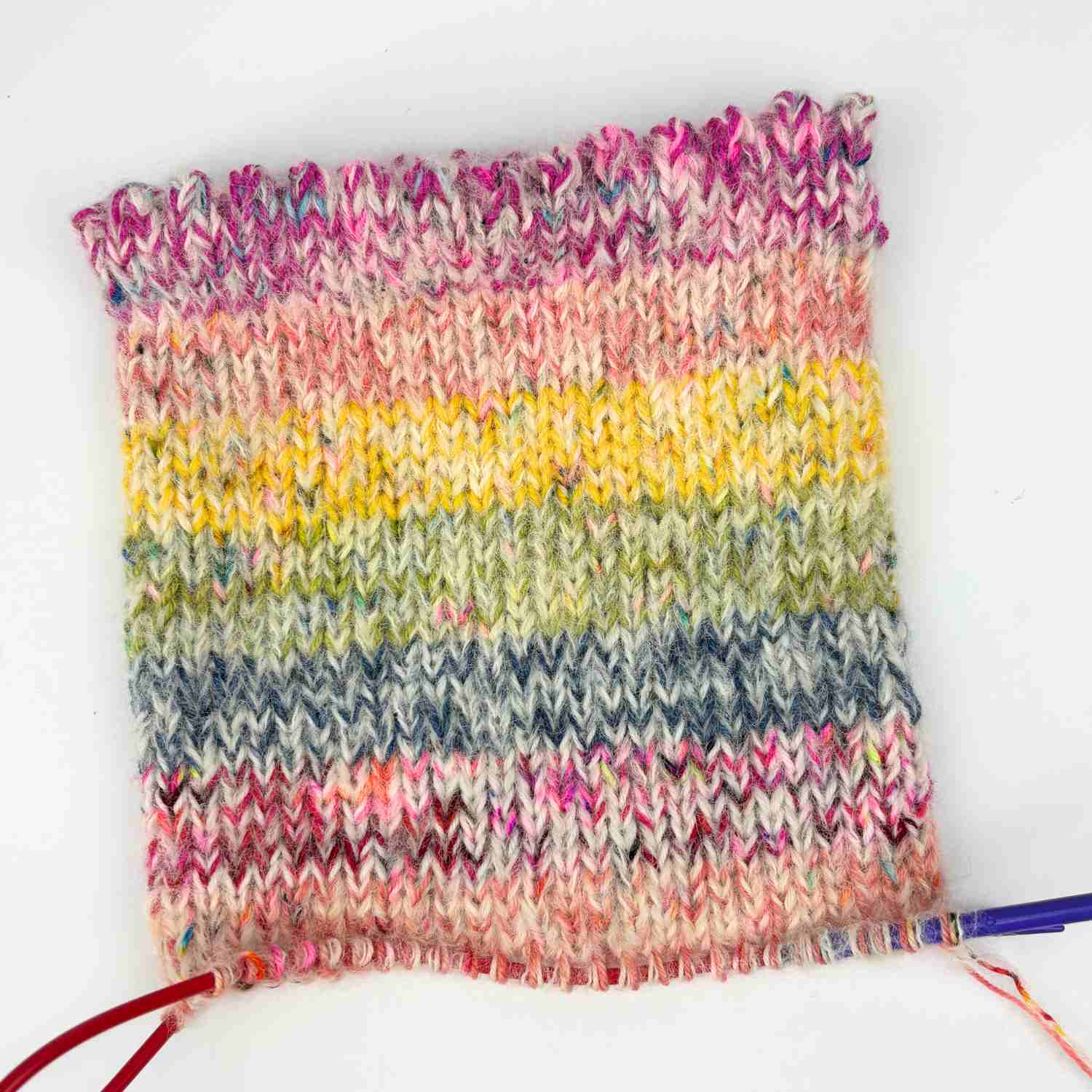 Knitted stripes in gift bag with picot channel.