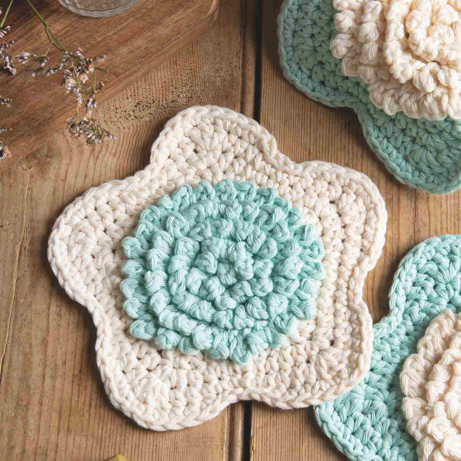 Crochet Flower Scrubbie with textured centre in contrast colour, made from free crochet scrubbie pattern by Lynne Rowe