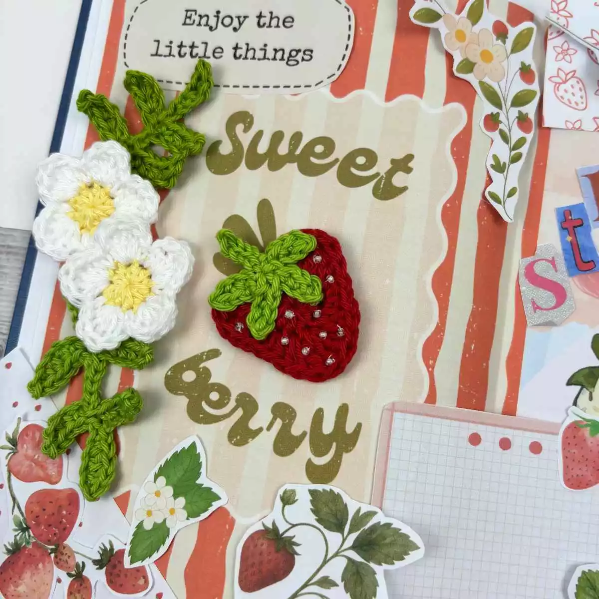 2 mini crochet flower motifs made from free crochet pattern, shown on a junk journal layout spread.