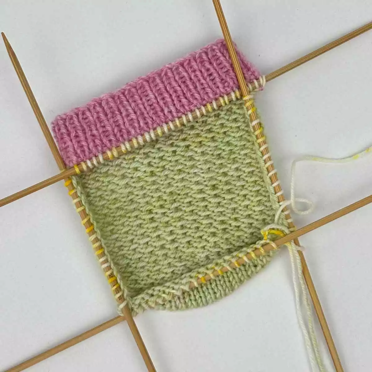 showing stitches picked up for gusset for knitting socks