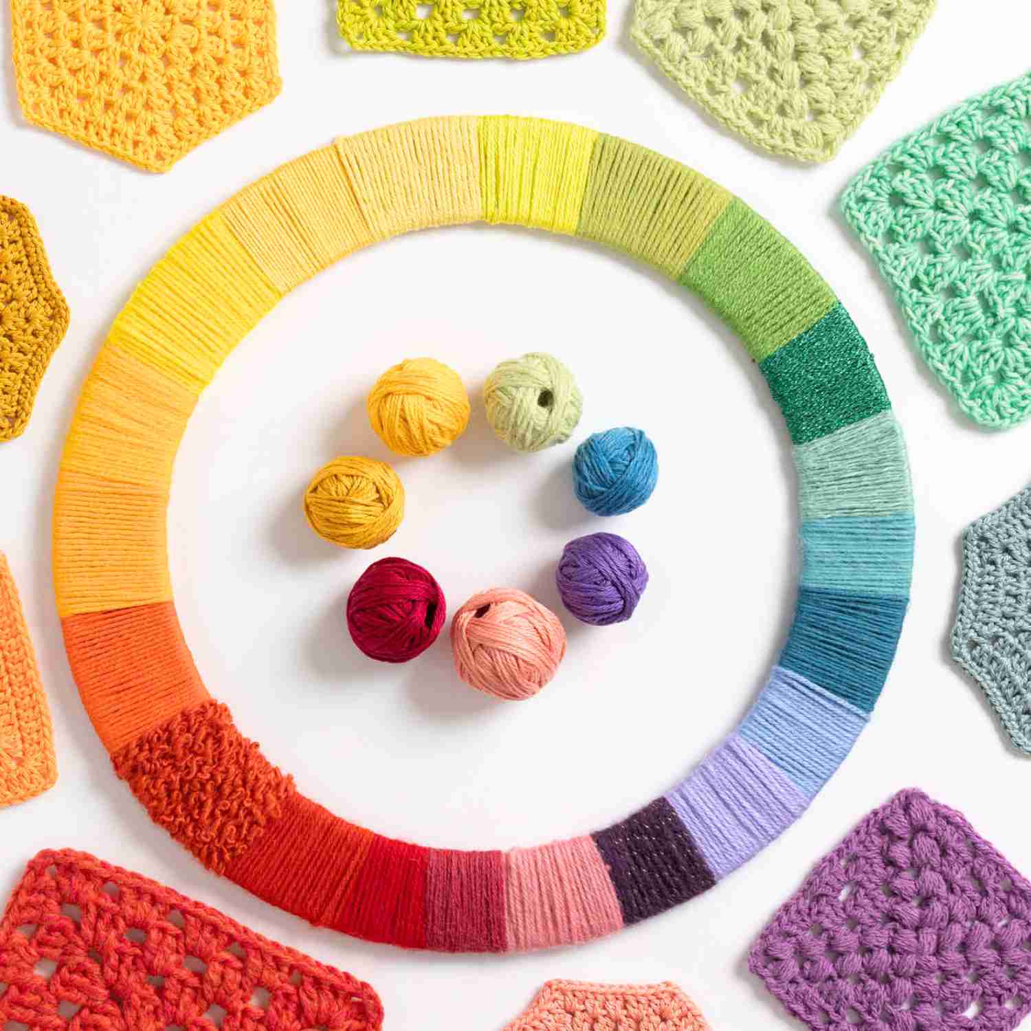 colour wheel showing crochet samples alongside the yarn wrapped colour wheel